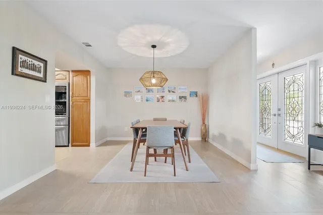 a bedroom with a bed and dresser