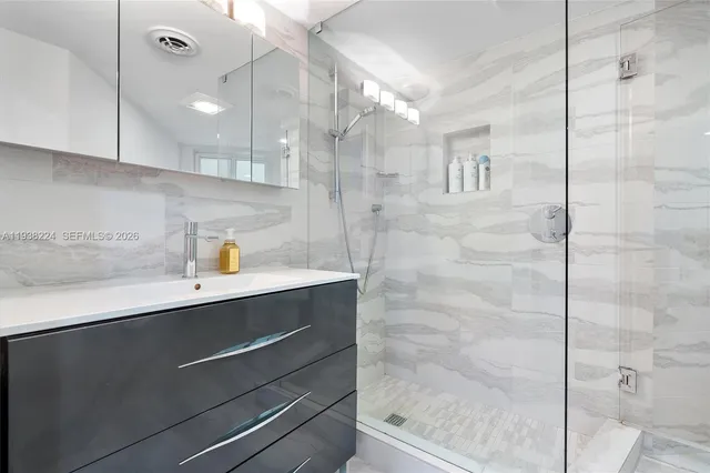 a view of a house with backyard and porch