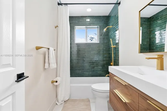 a work room with furniture and windows