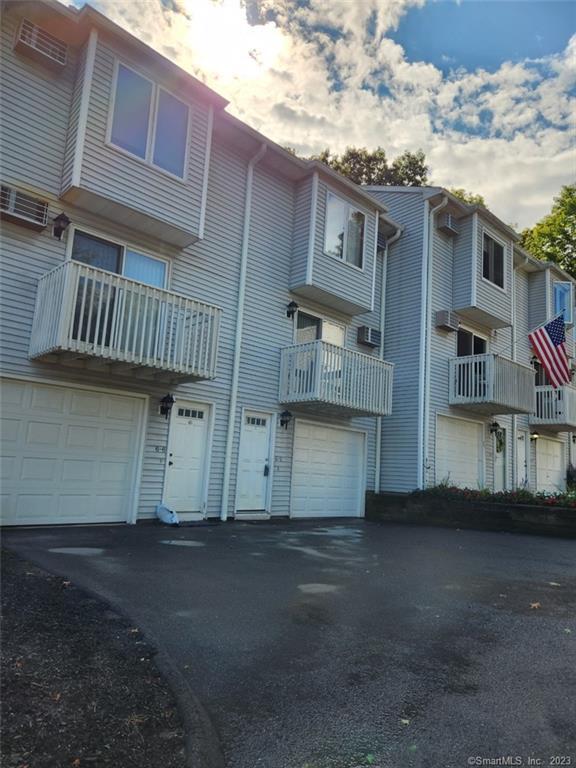 1001 Old Colony Road, Unit 65 Meriden, CT 06451 - Photo 1 of 1 a view of a house with a street