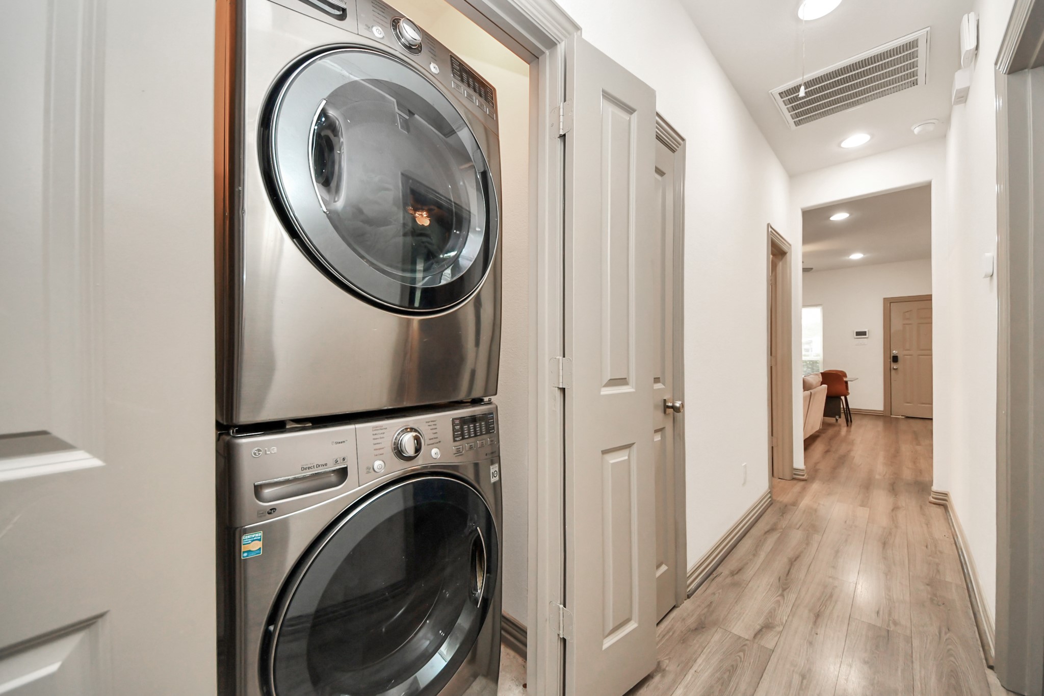 5334 Pershing Street Houston, TX 77033 - Photo 18 of 43 a view of a hallway with washer and dryer
