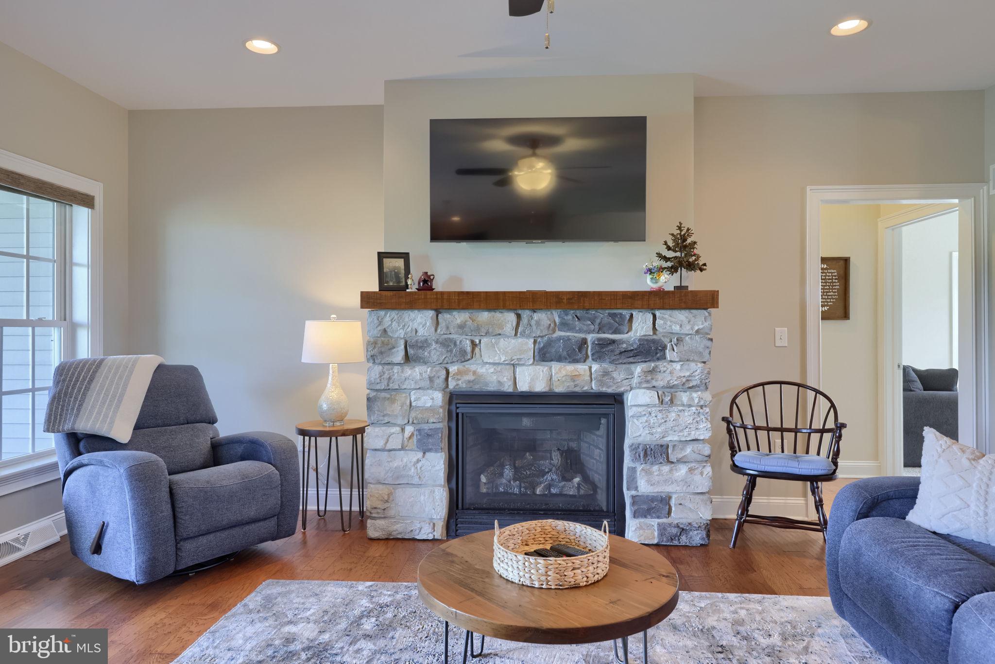 267 Prospect Road Mount Joy, PA 17552 - Photo 25 of 68 Cozy living space with stone fireplace.