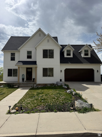 965 North 800 East Springville, UT 84663 - Photo 2 of 46 Modern farmhouse style home with roof with shingles, a front lawn, driveway, a porch, and a garage