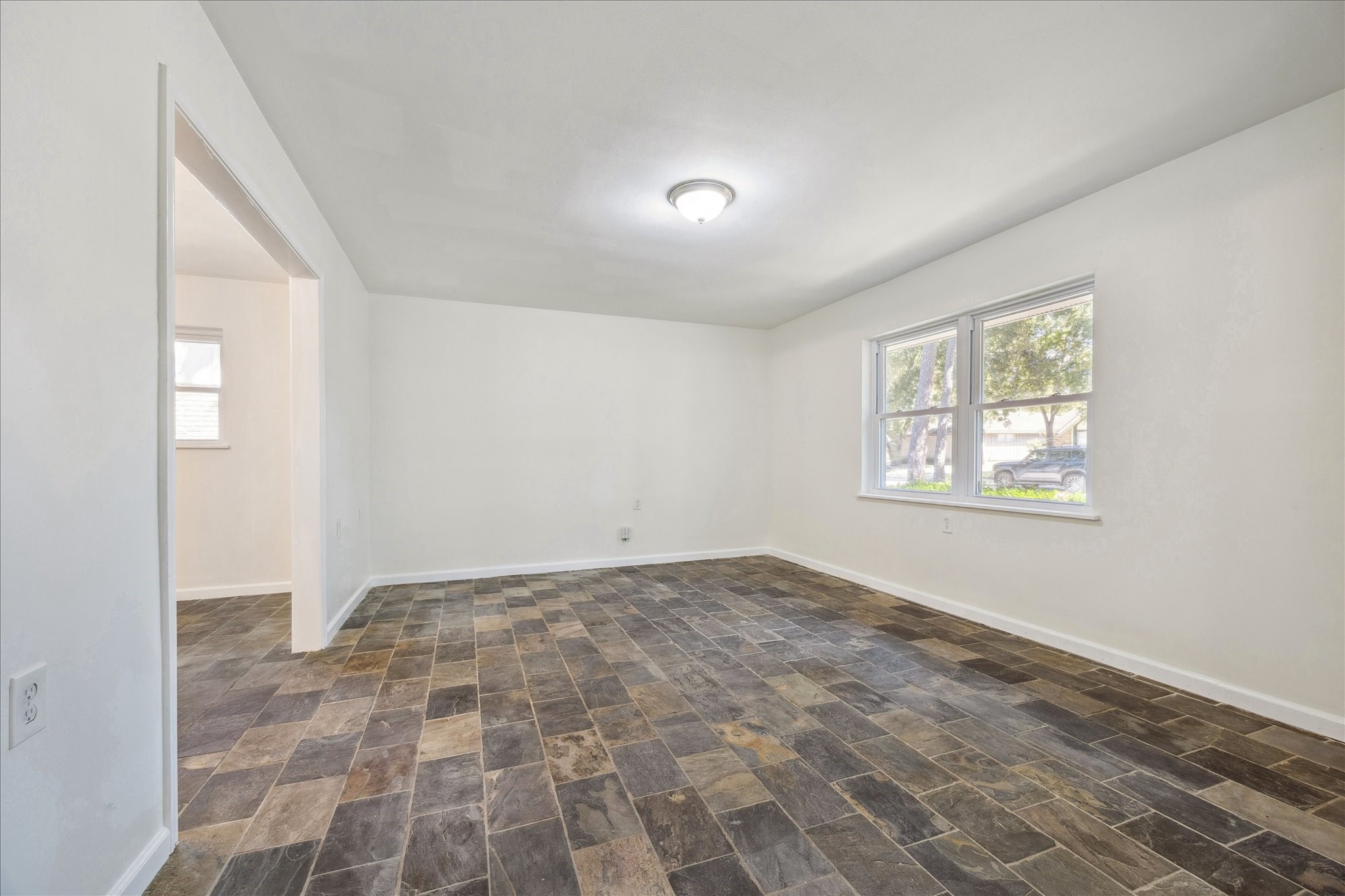 9014 Dunlap Street Houston, TX 77074 - Photo 13 of 23 Additional view of the flex space with views overlooking the front yard.