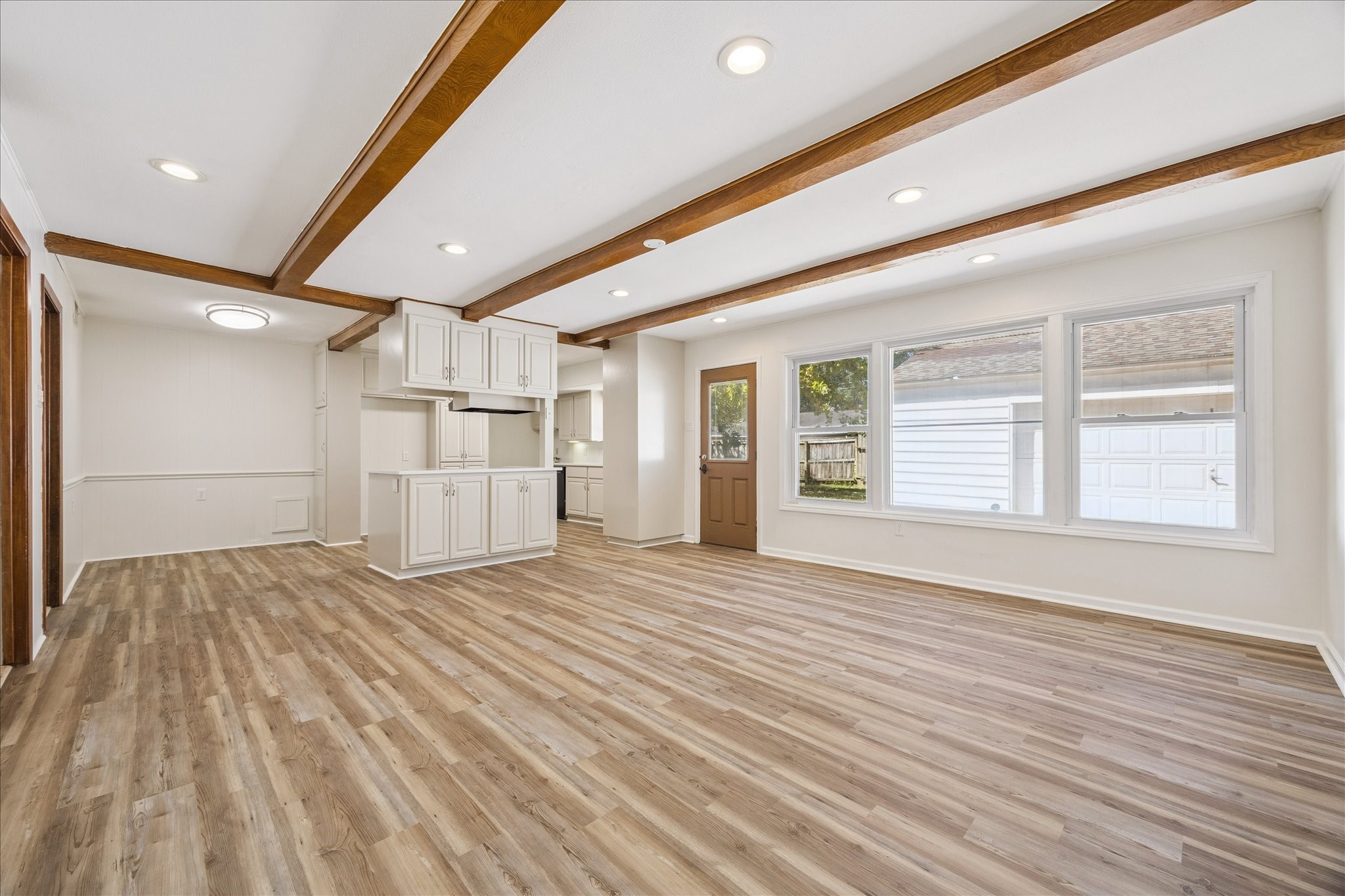 9014 Dunlap Street Houston, TX 77074 - Photo 7 of 23 The spacious family room fills with natural light from the large windows. The family room and kitchen has direct access to the backyard and 2 car garage.