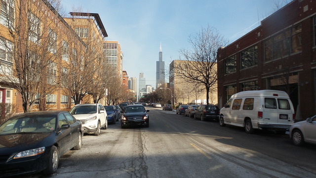 1244 West Monroe Street, Unit 1 Chicago, IL 60607 - Photo 2 of 25 a car parked in front of a building