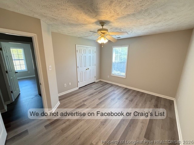 132 Congaree Drive Raeford, NC 28376 - Photo 10 of 13 wooden floor in an empty room with a window