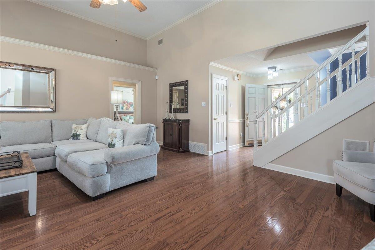 3169 Hedgemore Cove Bartlett, TN 38135 - Photo 5 of 31 a living room with furniture and a wooden floor