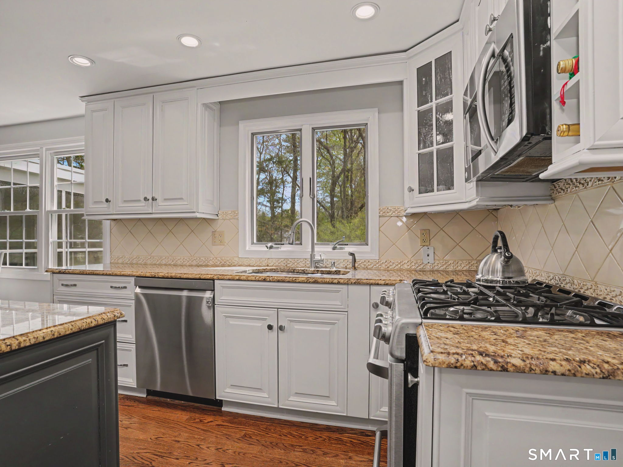 45 Wendover Road Trumbull, CT 06611 - Photo 15 of 33 Enjoy stainless steel appliances including a gas range.