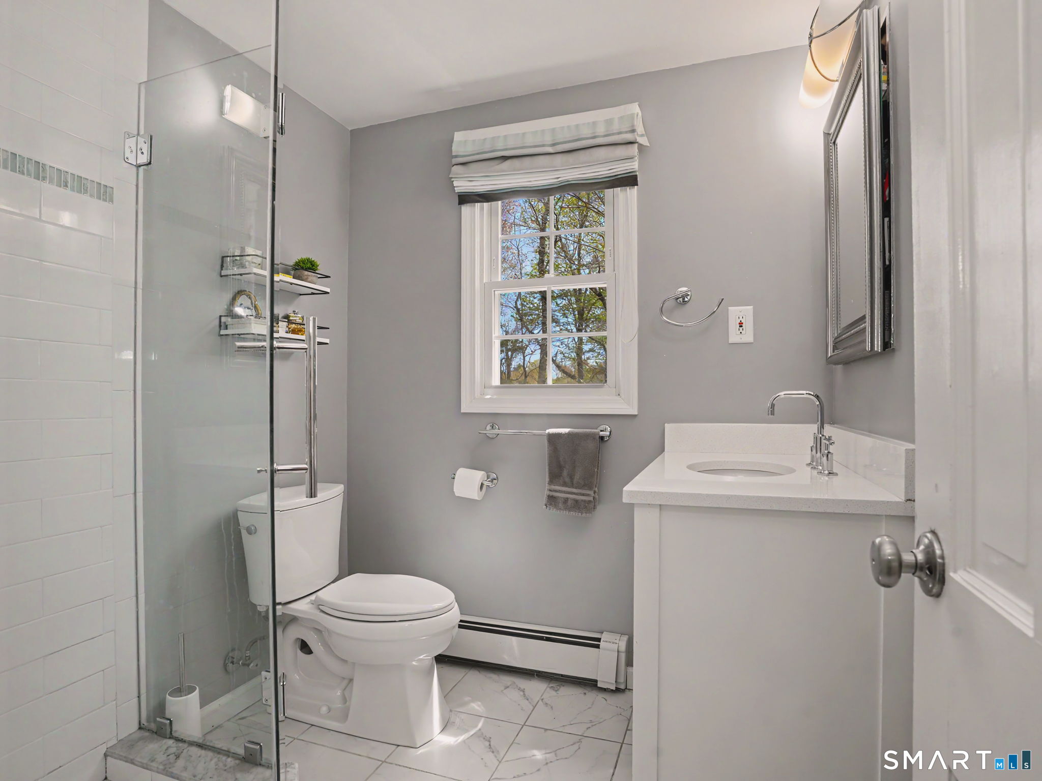45 Wendover Road Trumbull, CT 06611 - Photo 26 of 33 Updated Full Primary Bath with glass shower.
