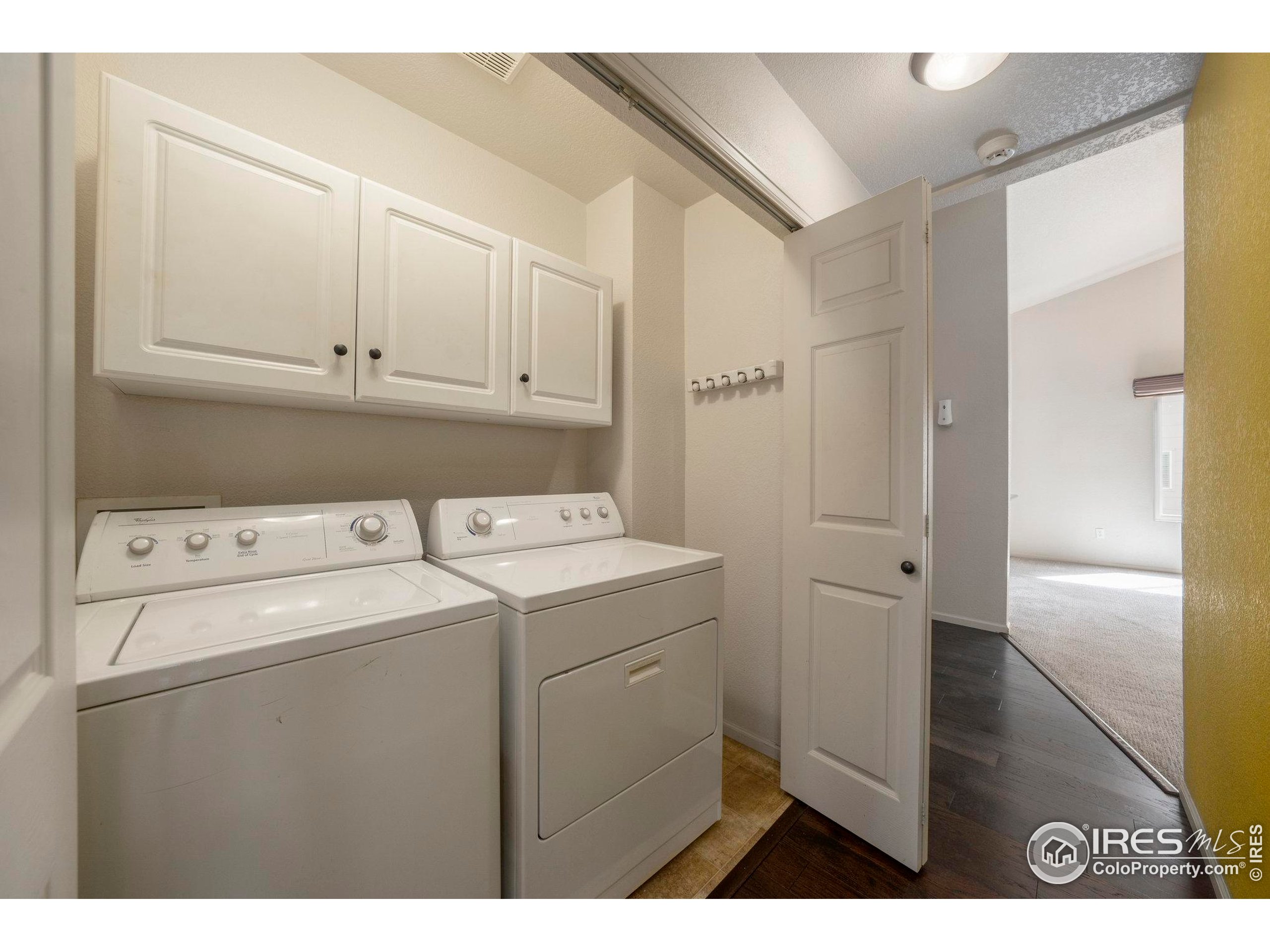 5740 High Street Frederick, CO 80504 - Photo 16 of 34 a utility room with dryer and washer