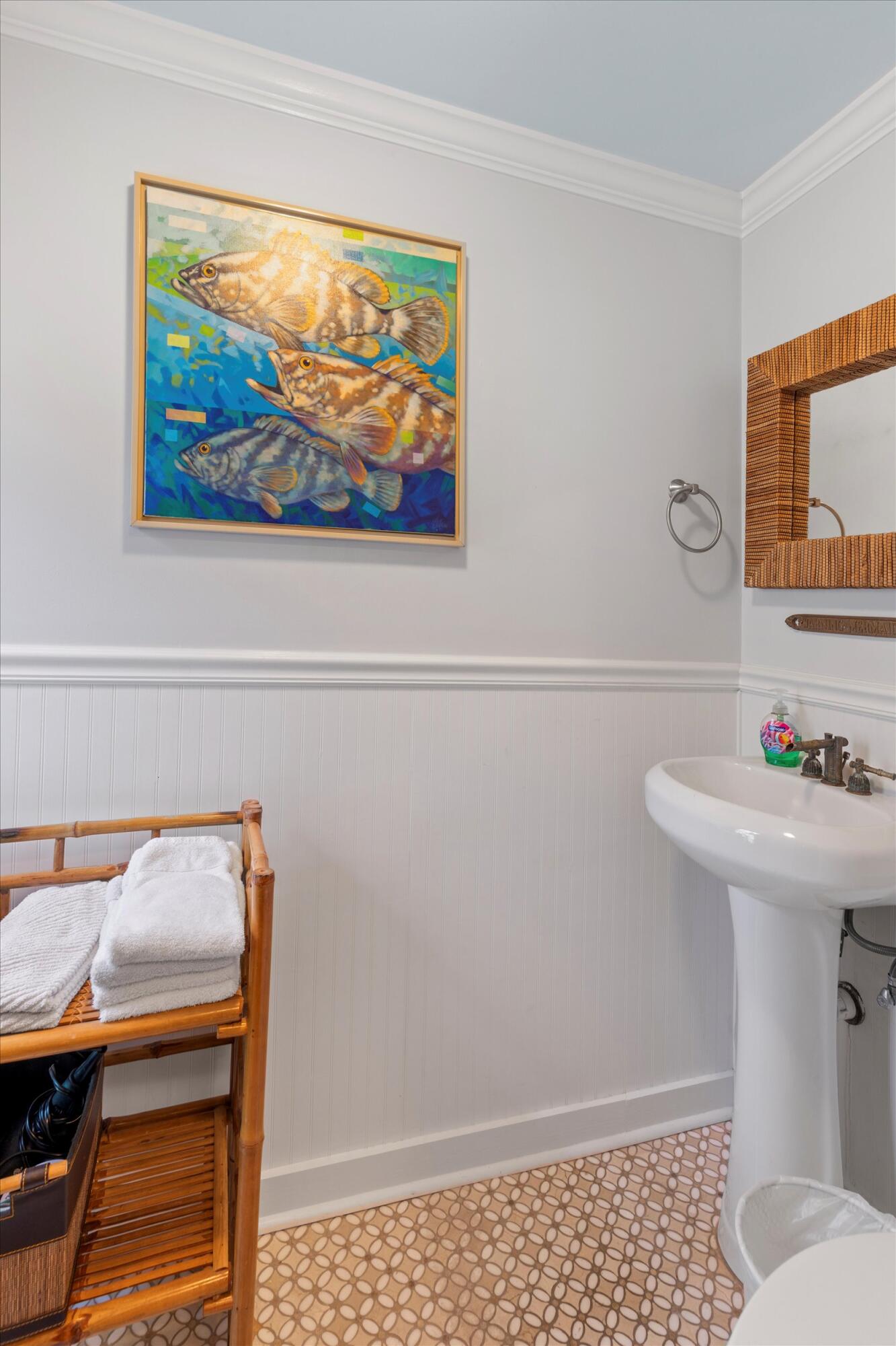 626 Margaret Street Key West, FL 33040 - Photo 15 of 45 a bathroom with a sink a toilet and a mirror