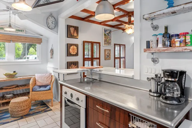 a kitchen with a stove and a sink