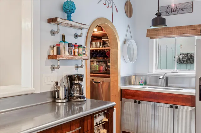a view of kitchen with furniture and window