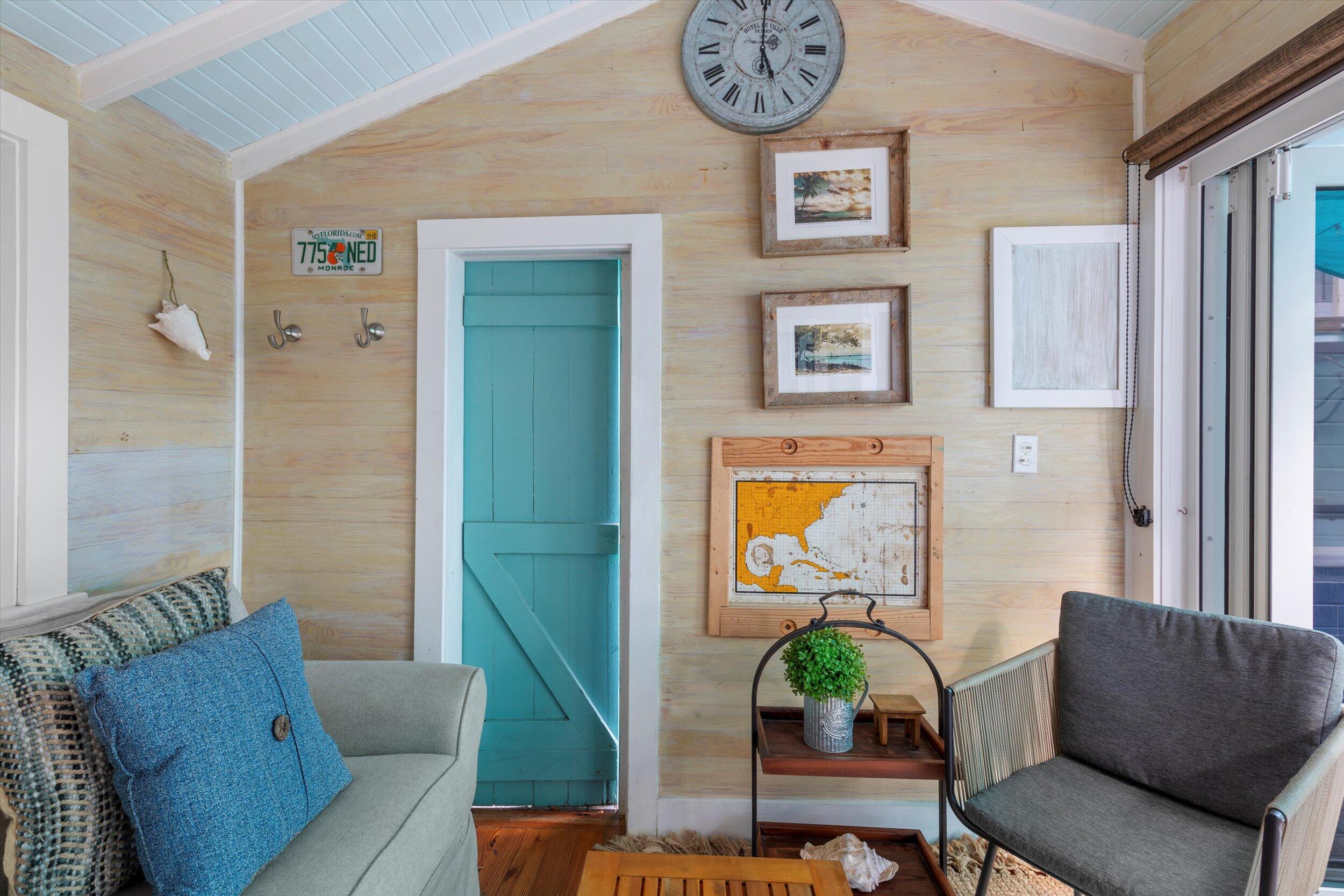 626 Margaret Street Key West, FL 33040 - Photo 29 of 45 a living room with furniture and a window