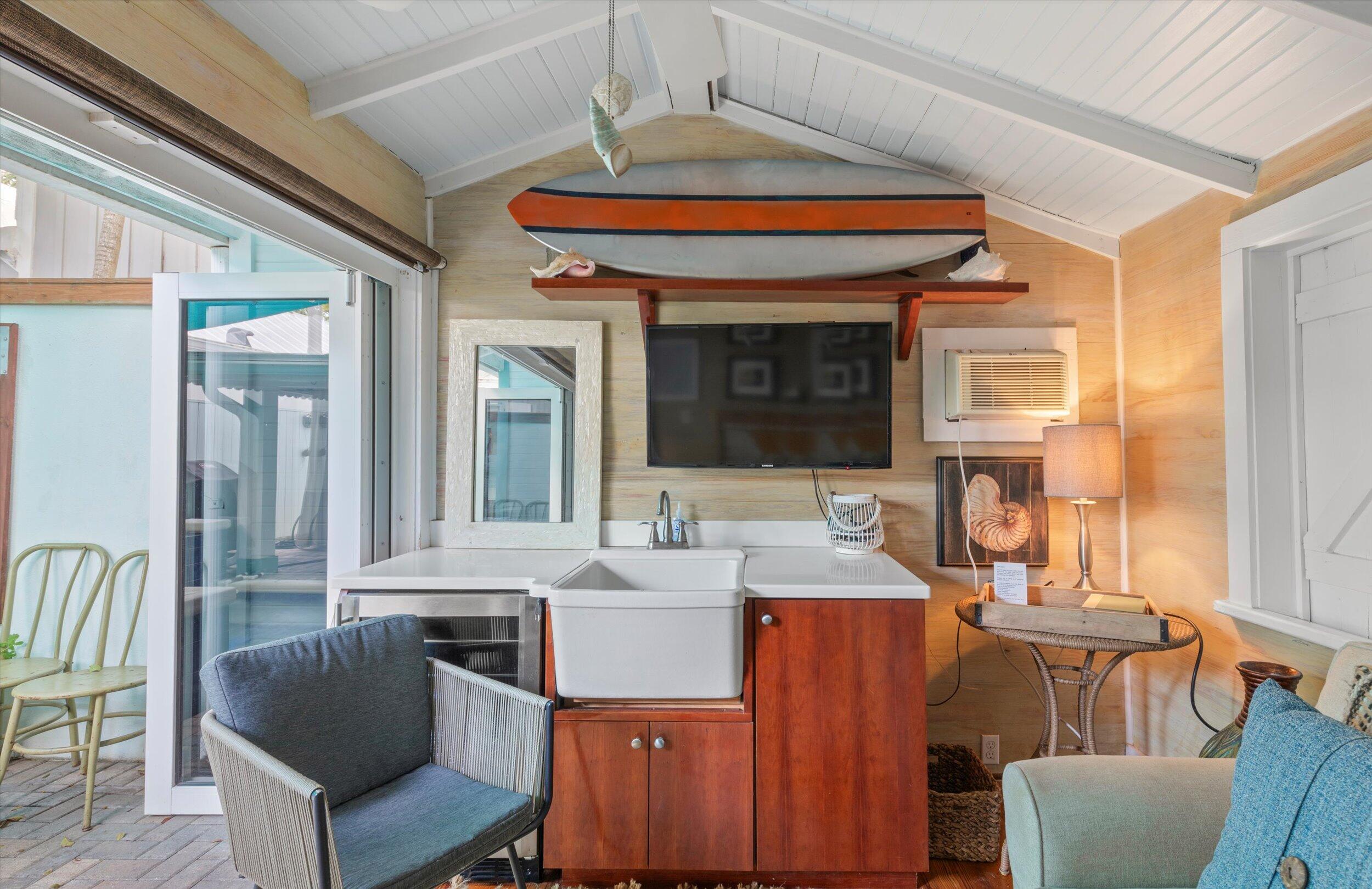 626 Margaret Street Key West, FL 33040 - Photo 31 of 45 a view of a dining room with furniture window and outside view