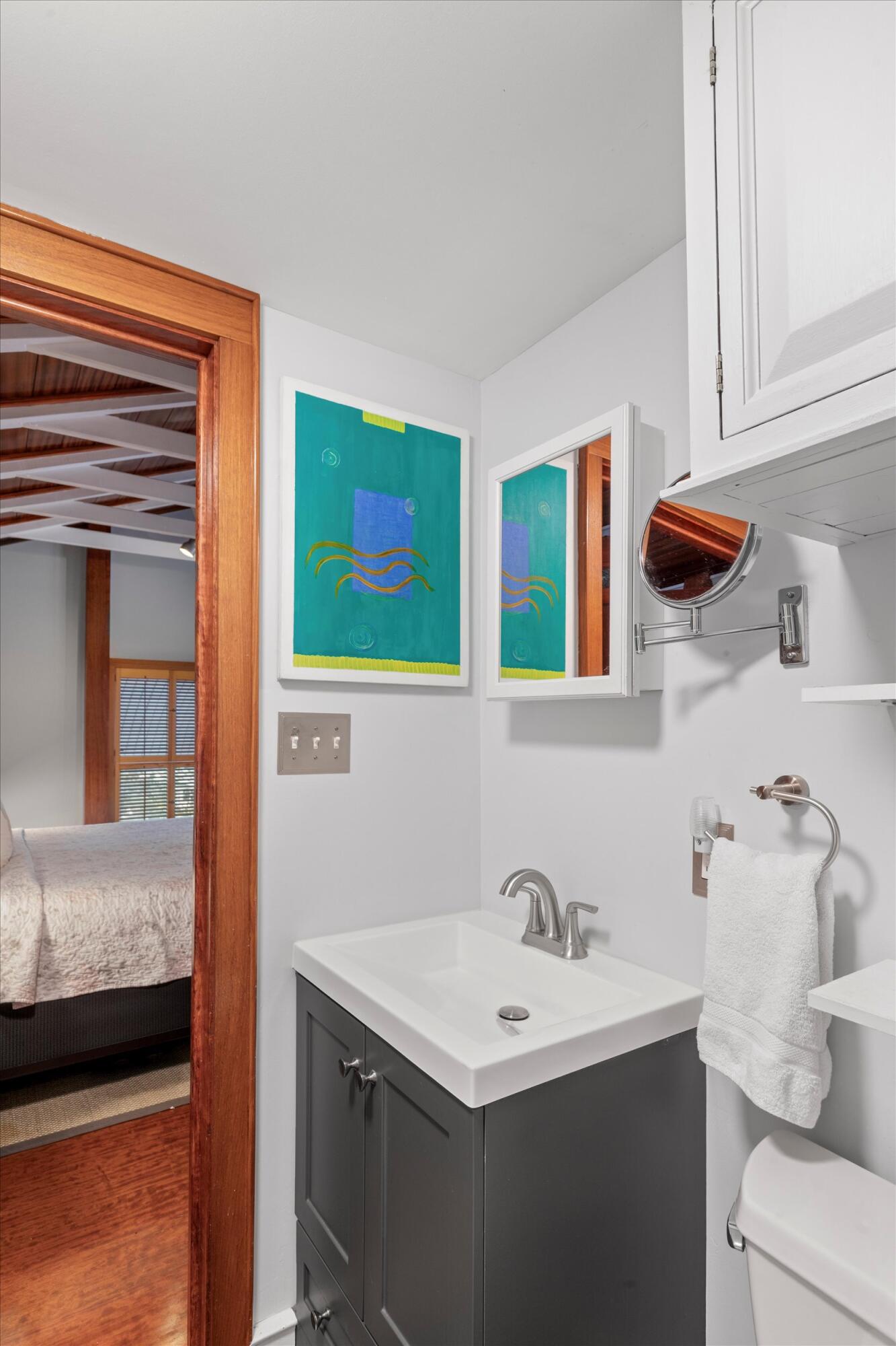 626 Margaret Street Key West, FL 33040 - Photo 36 of 45 a bathroom with a sink and a mirror