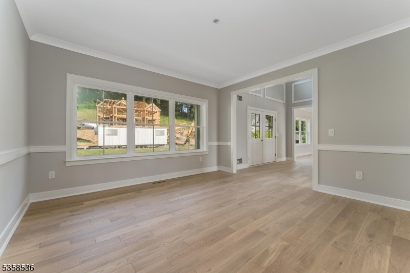 4 Spring Court Phillipsburg, NJ 08865 - Photo 19 of 30 an empty room with wooden floor and windows
