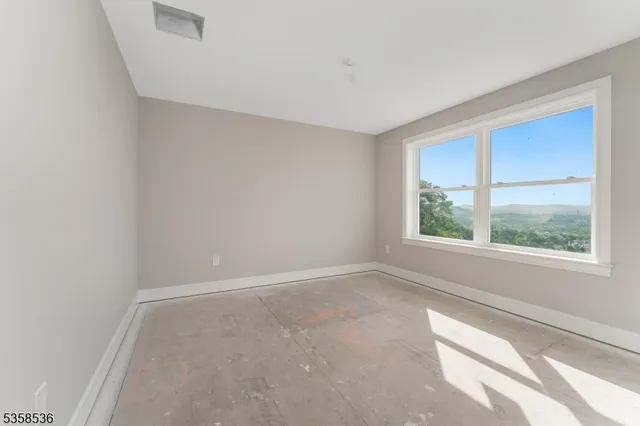 an empty room with windows