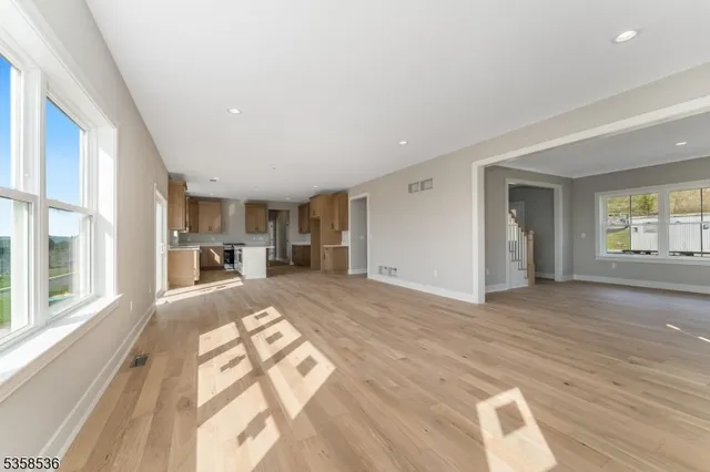 a view of living room with furniture and window
