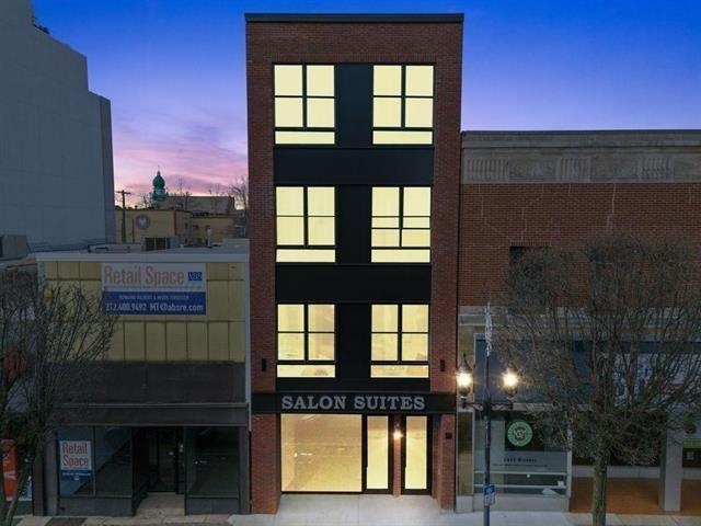 491 Broadway, Unit 202 Bayonne, NJ 07002 - Photo 18 of 20 a view of a building from a hallway