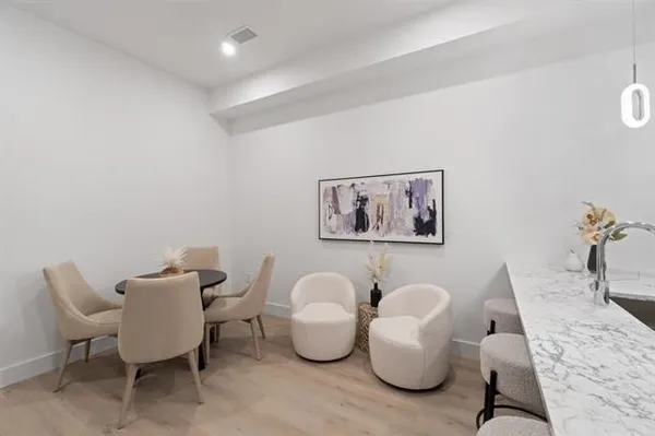 a view of a room with lounge chairs
