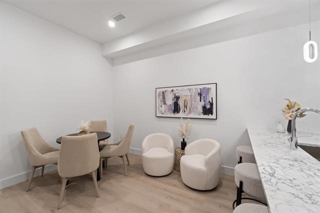 491 Broadway, Unit 202 Bayonne, NJ 07002 - Photo 6 of 20 a view of a room with lounge chairs