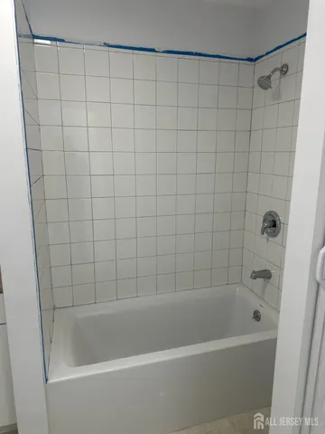 a bathroom with a bathtub