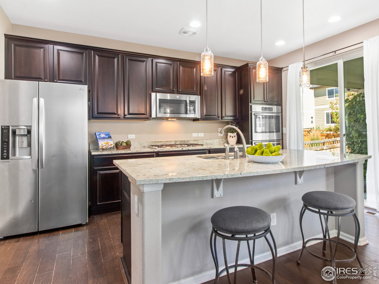 3318 Quicksilver Road Frederick, CO 80516 - Photo 7 of 28 Large island with breakfast bar