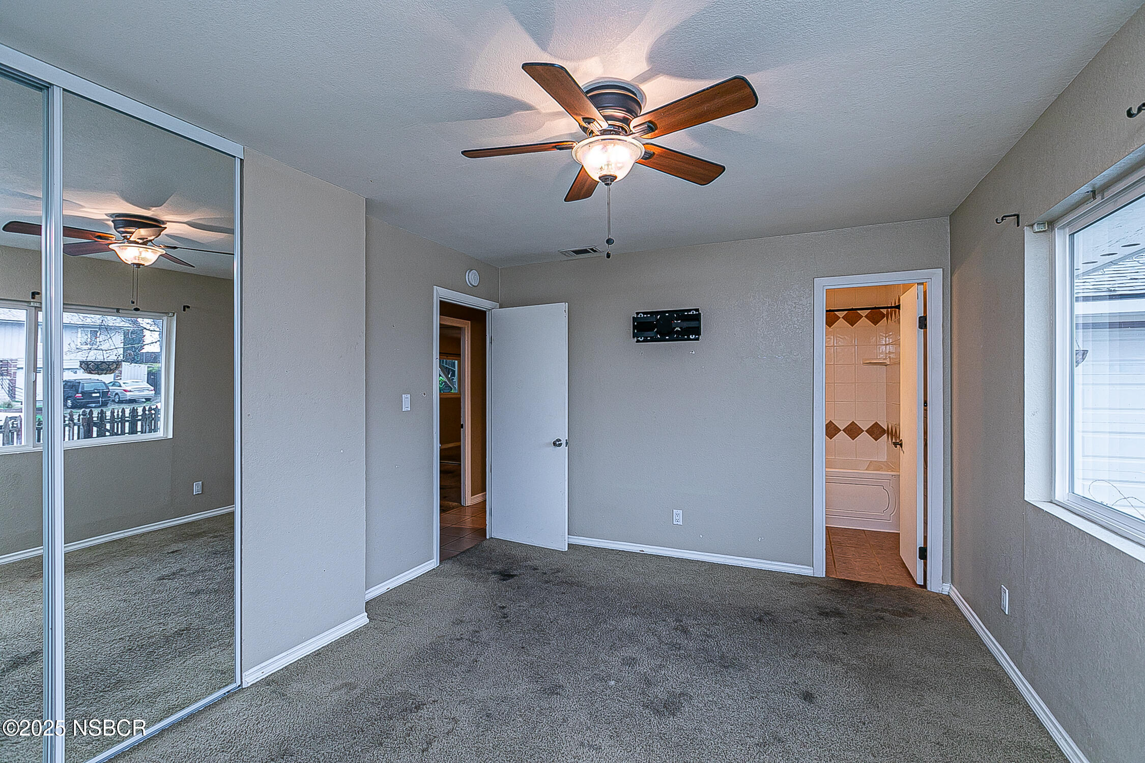 533 Sunbeam Road Lompoc, CA 93436 - Photo 13 of 27 a view of an empty room with a window