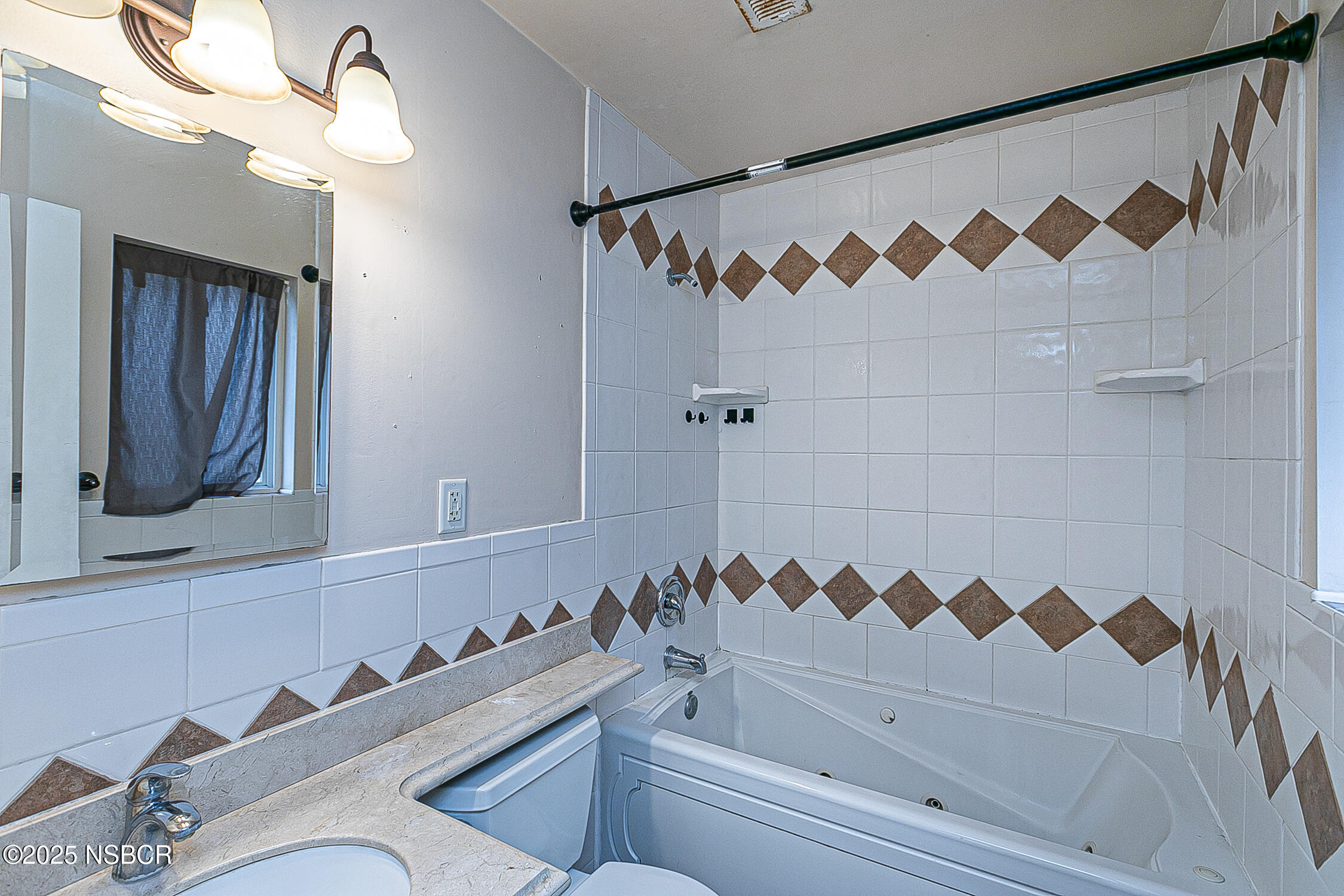 533 Sunbeam Road Lompoc, CA 93436 - Photo 14 of 27 a bathroom with a bathtub and a shower