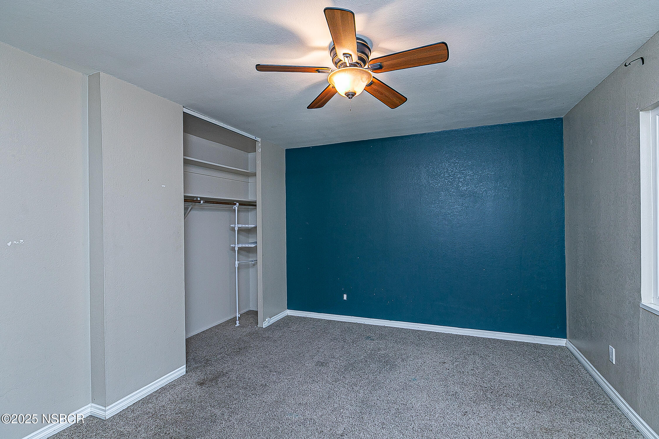 533 Sunbeam Road Lompoc, CA 93436 - Photo 16 of 27 an empty room with closet and fan