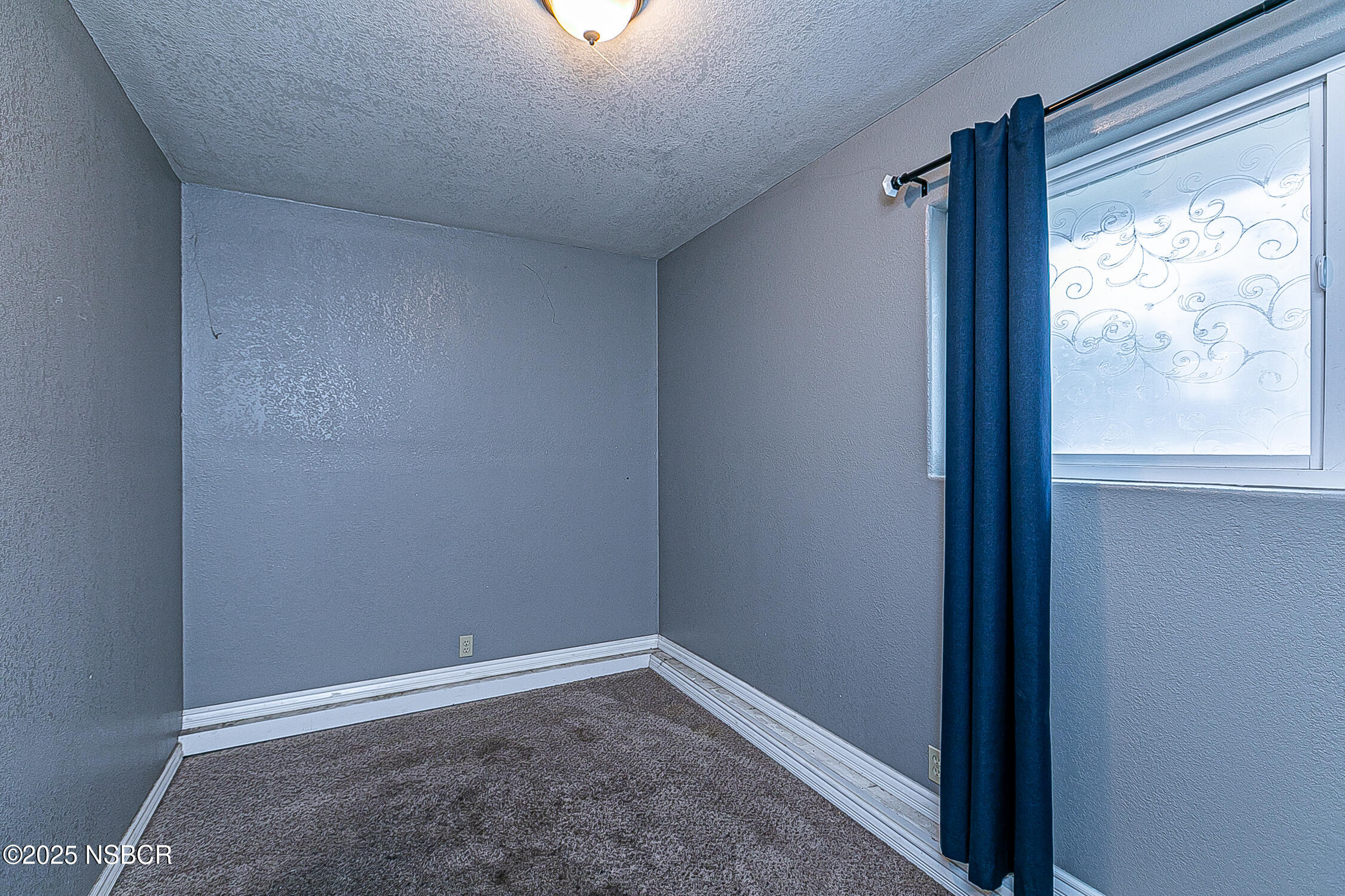 533 Sunbeam Road Lompoc, CA 93436 - Photo 21 of 27 a view of an empty room and a window