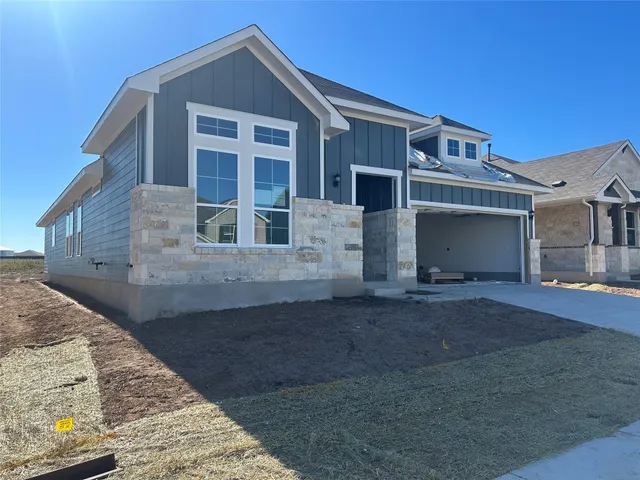 front view of a house with a street