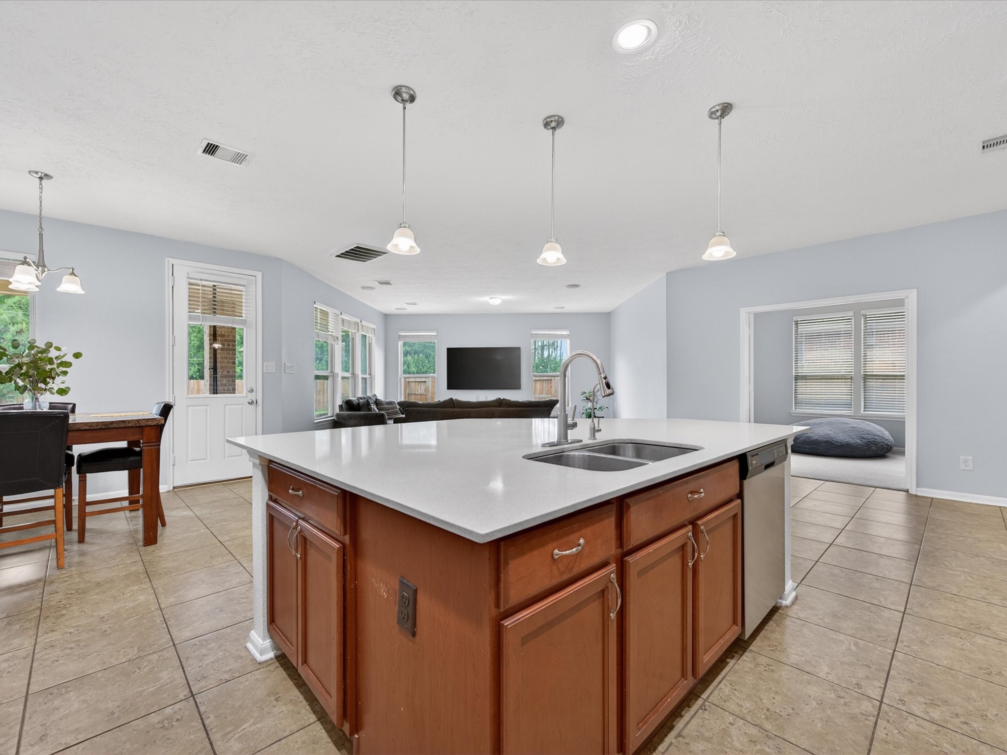 20703 Fawn Timber Trail Humble, TX 77346 - Photo 11 of 42 a kitchen with a sink a counter top space and appliances