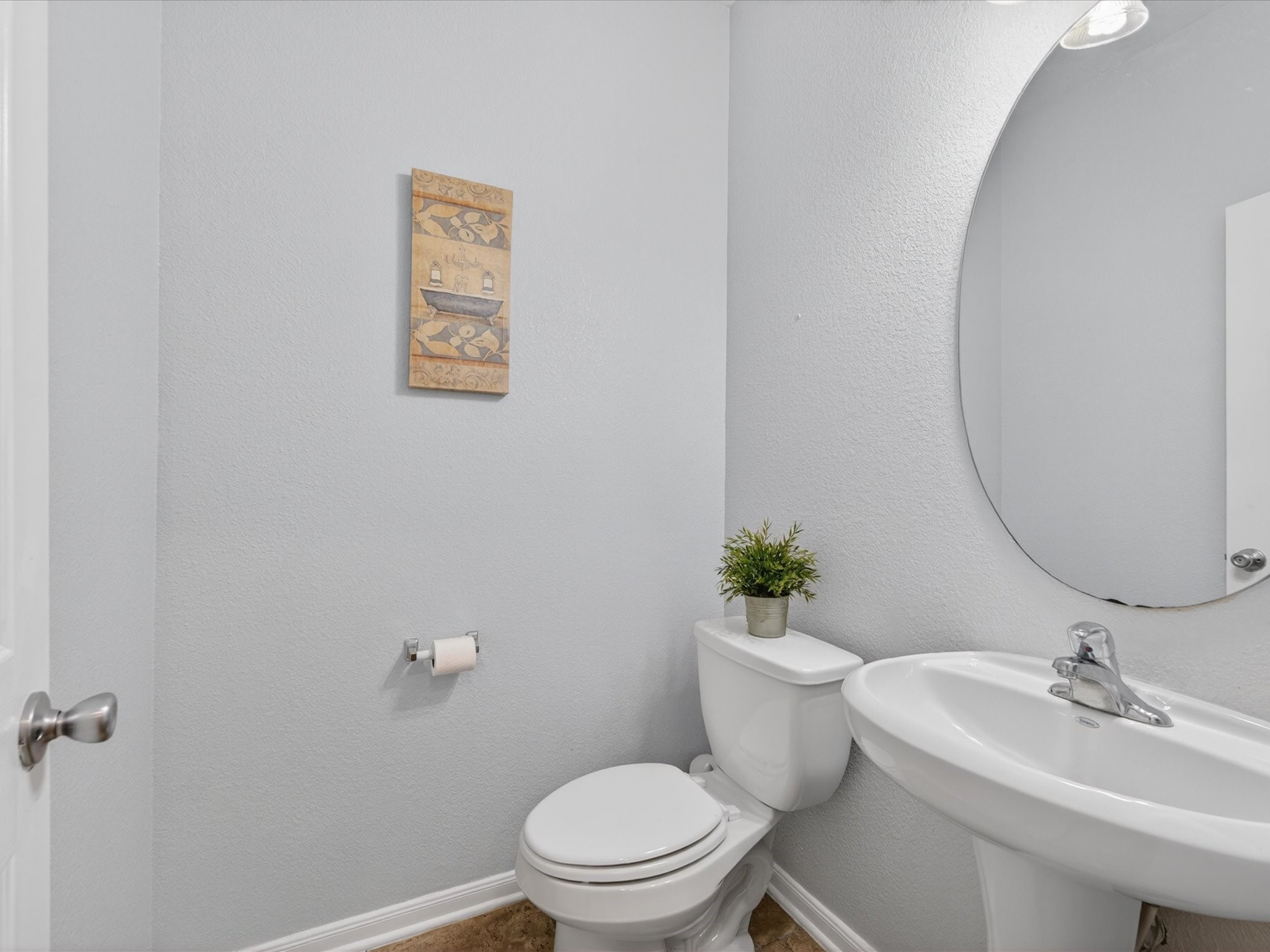 20703 Fawn Timber Trail Humble, TX 77346 - Photo 13 of 42 a bathroom with a sink mirror and a toilet