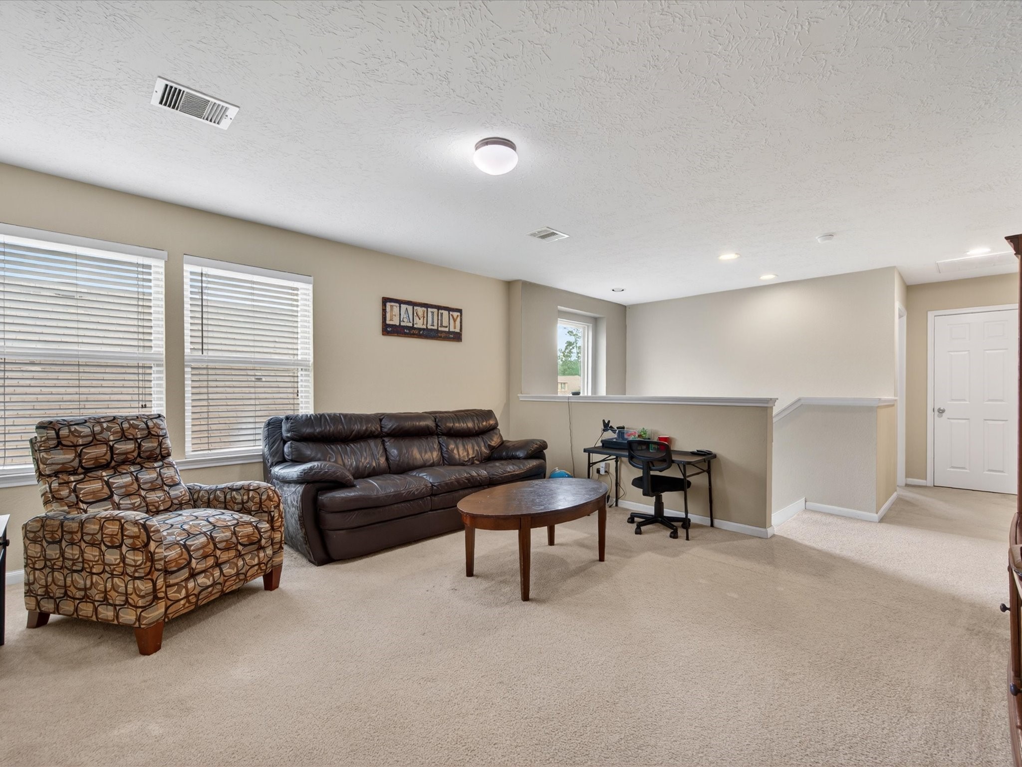 20703 Fawn Timber Trail Humble, TX 77346 - Photo 16 of 42 a living room with furniture and a window