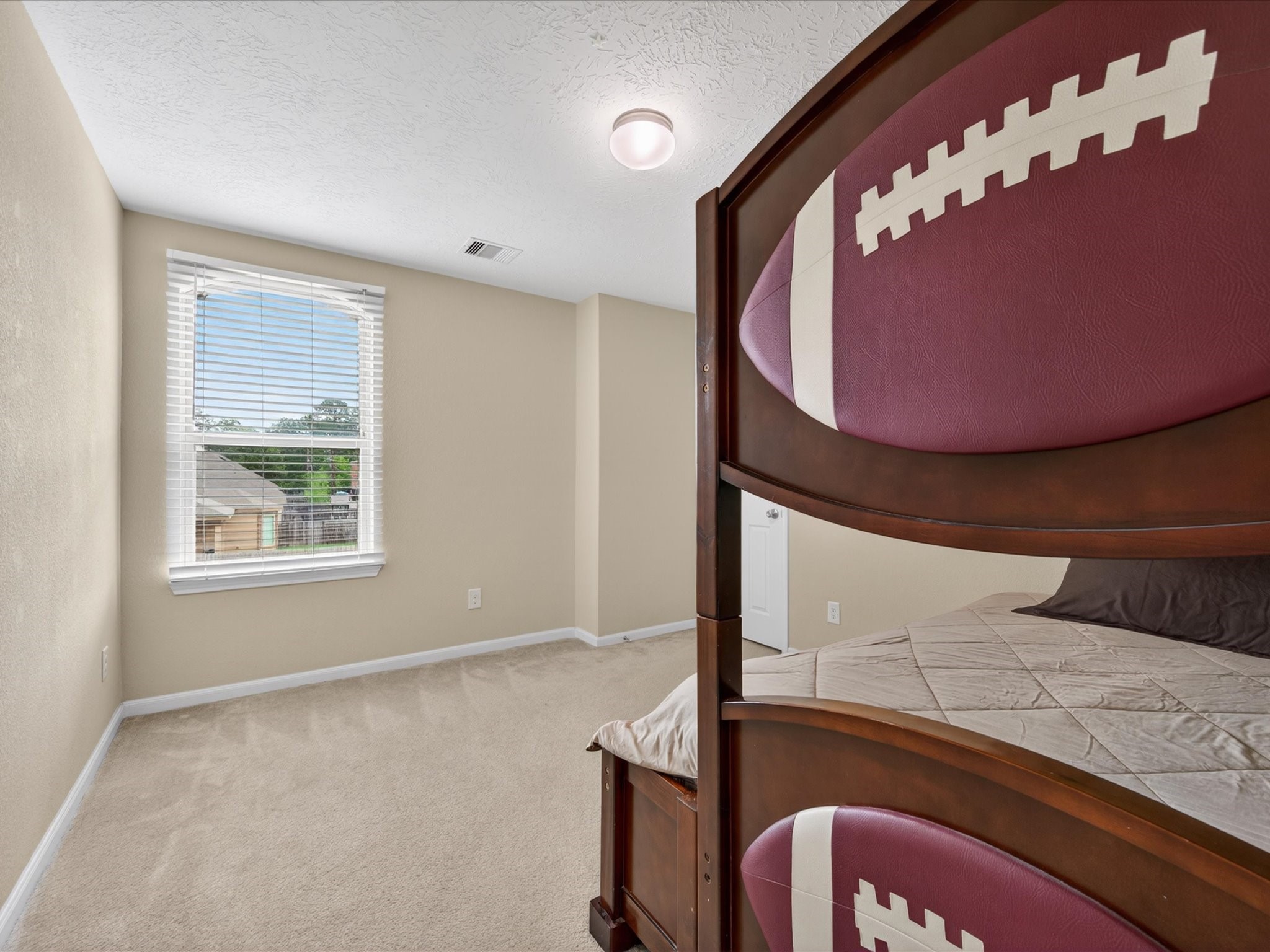 20703 Fawn Timber Trail Humble, TX 77346 - Photo 24 of 42 a view of a hallway with two windows