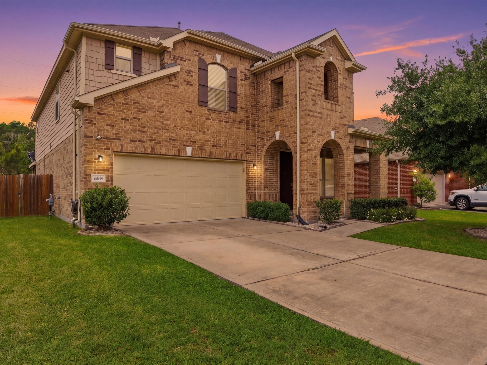 20703 Fawn Timber Trail Humble, TX 77346 - Photo 42 of 42 a front view of a house with a yard and garage