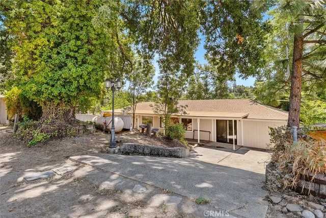 a house with trees in front of it