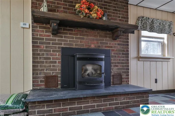 a fireplace with wooden floor