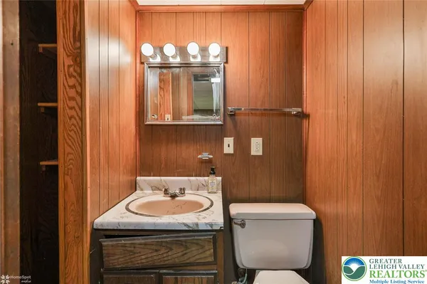 a bathroom with a sink and a toilet