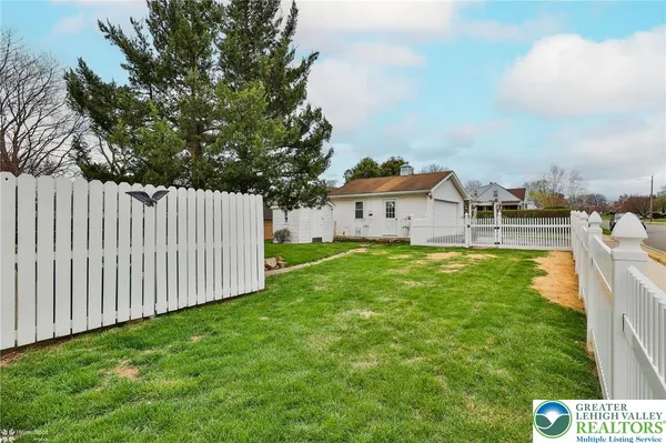 a house view with a garden space