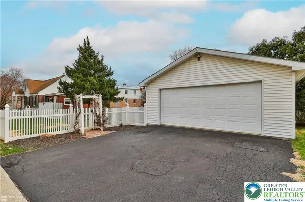 a view of a house with a garage