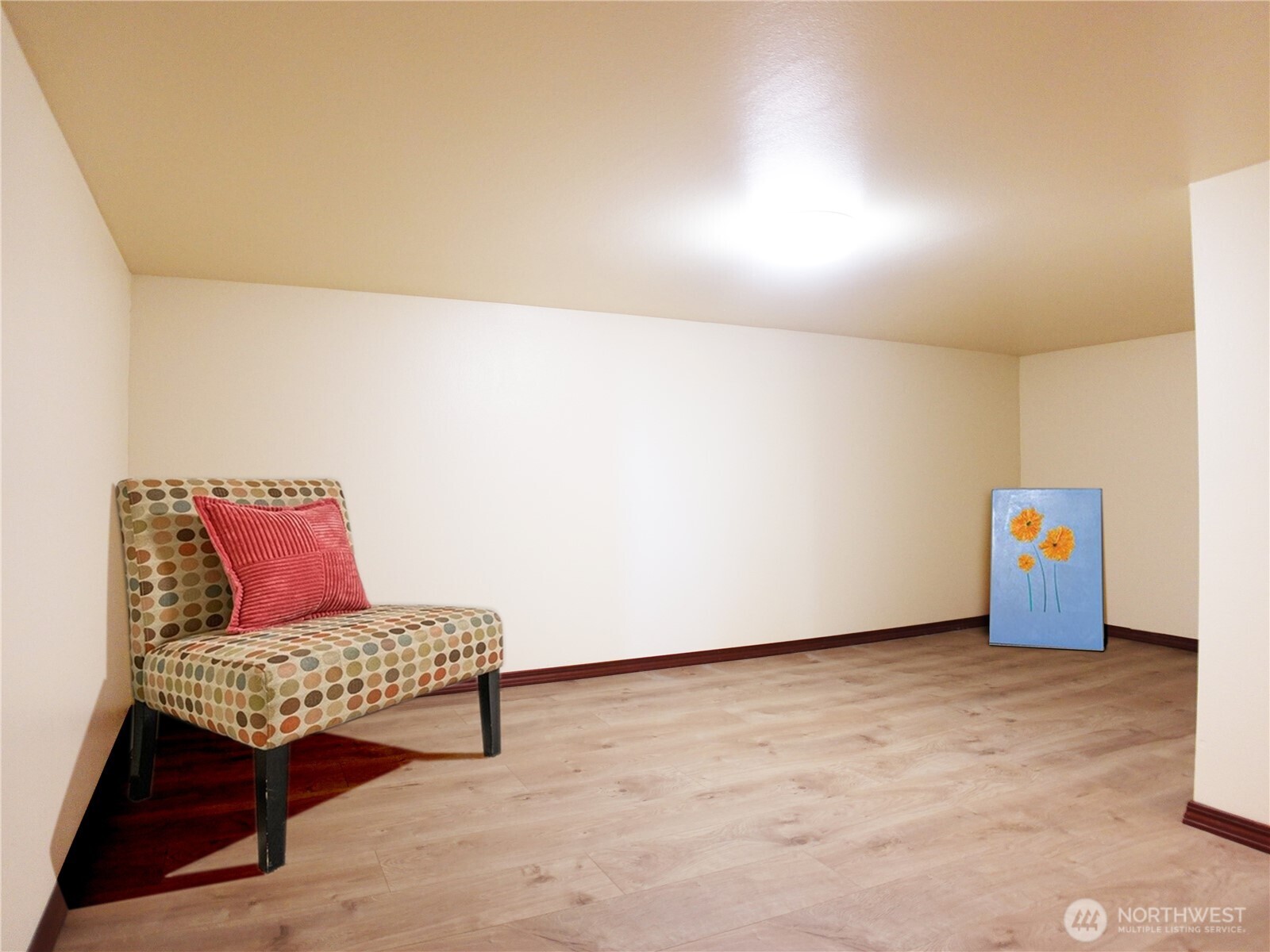 5451 32nd Avenue Southwest Seattle, WA 98126 - Photo 14 of 34 a living room with a couch and a dresser with wooden floor
