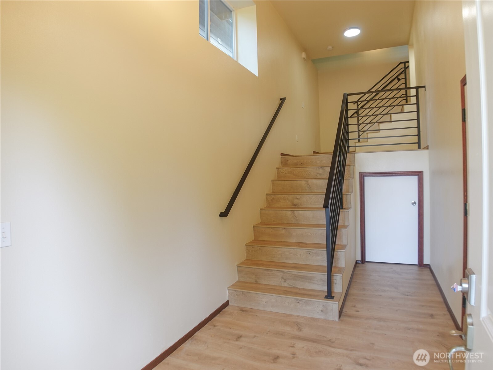 5451 32nd Avenue Southwest Seattle, WA 98126 - Photo 16 of 34 a view of entryway and hall with wooden floor