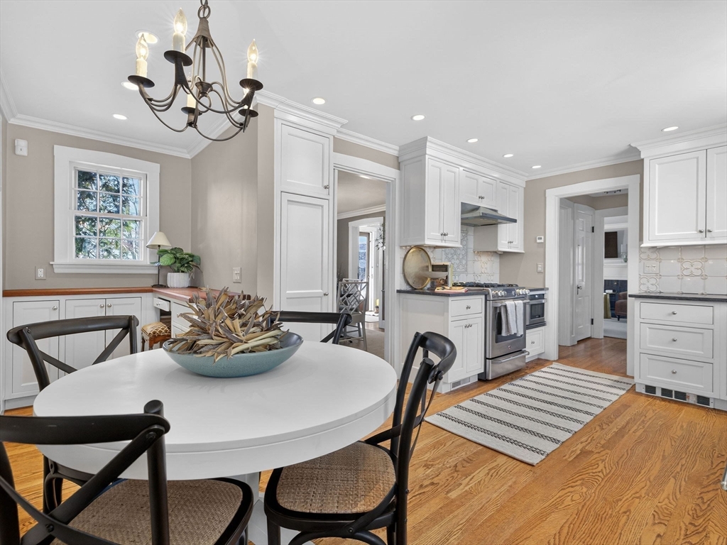 5 Tennyson Road Wellesley, MA 02481 - Photo 11 of 28 a view of a dining room with furniture and chandelier