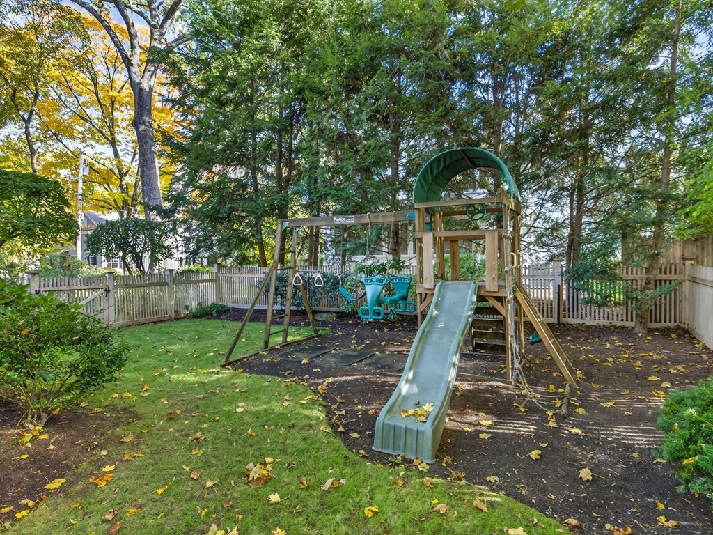 5 Tennyson Road Wellesley, MA 02481 - Photo 25 of 28 a view of a slide in a backyard