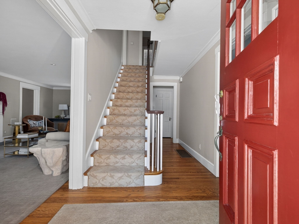 5 Tennyson Road Wellesley, MA 02481 - Photo 3 of 28 a view of entryway and hall with wooden floor
