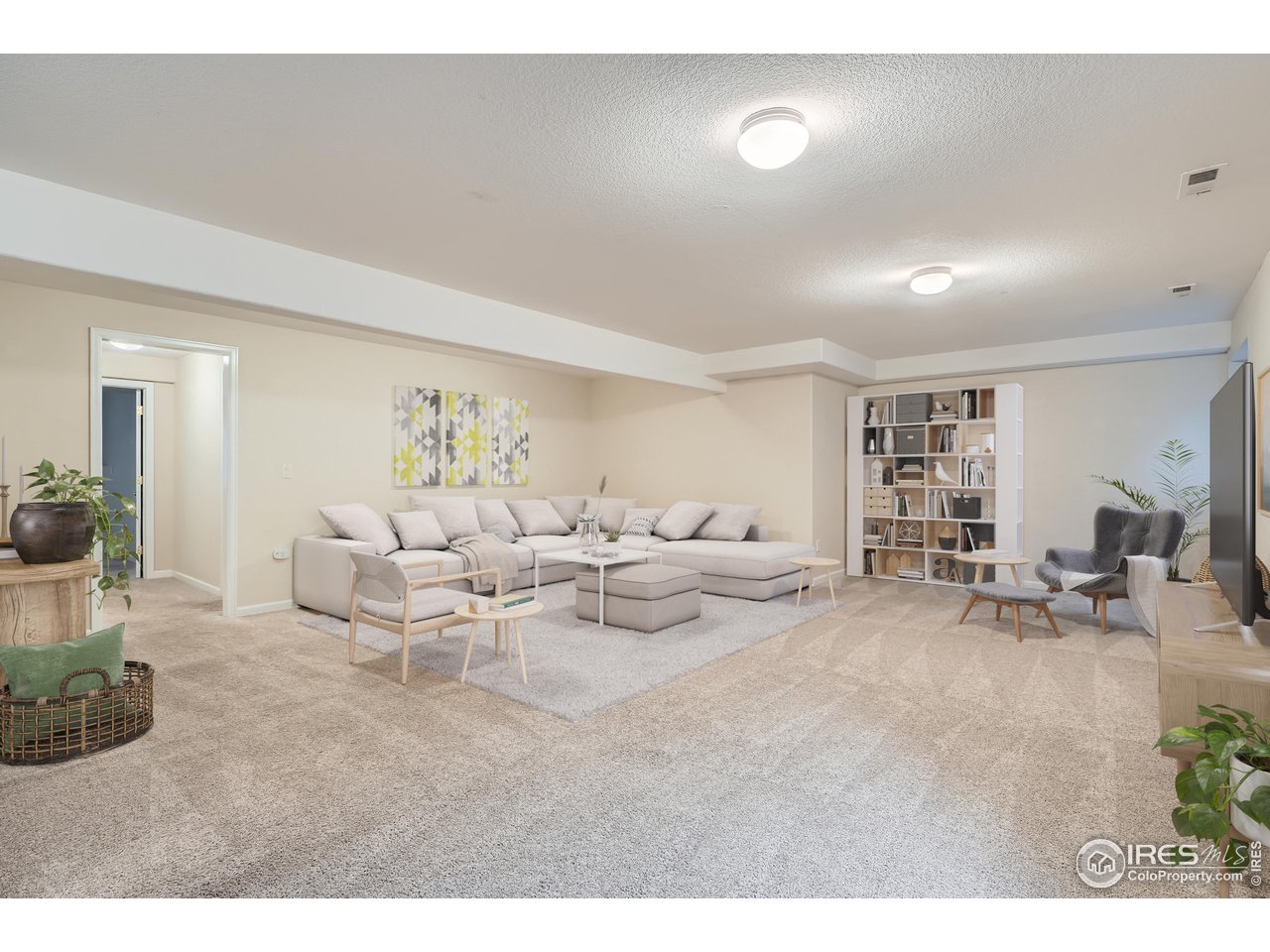 7051 Johnson Circle Niwot, CO 80503 - Photo 21 of 34 a living room with furniture and a flat screen tv
